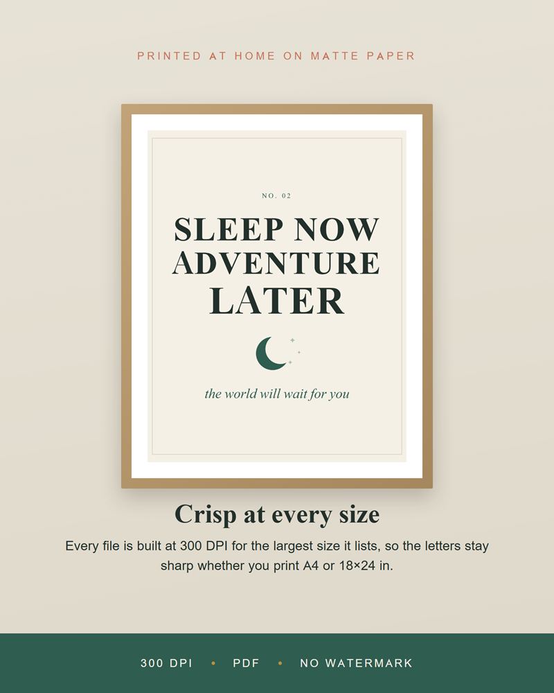 Close-up of the Sleep Now Adventure Later print in a wood frame, with a crescent moon under the words